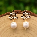 Elegant golden flower earrings with hanging white round pearls and minimalist design - Three Flowers Rice Pearl Drop Earrings