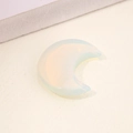 Polished milky white crescent moon stone pendant made of translucent glass material - Opalite