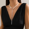 Elegant Y-shaped necklace with round white pearls and long tassel drop on a model - White Pearl Style (6201)