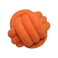 Handmade woven orange knot pillow crafted from soft lamb wool plush fabric - Vibrant Orange
