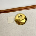 Macro detail of high-shine gold round brooch with smooth mirror finish on fabric - 29 Gold Disc Mushroom (Q-38)