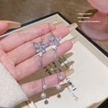 Elegant silver butterfly tassel earrings with shimmering crystals and white pearls - Butterfly Pearl Tassel (E0445)