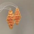 Macro detail of cascading orange shell petal earrings on a clear jewelry stand - 6# Silver Earring Post Orange Shell Tassel Studs