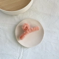 Weiche Plüsch-Haarklammer in Pastellrosa mit kuscheliger Kunstfell-Oberfläche - Orange