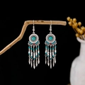 Bohemian tassel earrings with turquoise beads hanging on a rustic branch on black background - Retro Silver + Turquoise + Sun Tassel (E5813-2/Green)