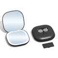 Portable black LED makeup mirror with open battery compartment and CR2032 cells - 5X Magnification / Battery Powered / Black