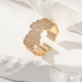 Verstellbarer Ring in Gold mit fünf rechteckigen Zirkonia-Gliedern auf Steingrund - Gold