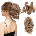 Short wavy light brown claw clip-on ponytail hair extension with natural highlights - Sandy Blonde (12H24)