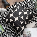 Detail of a square cushion cover featuring black and white geometric semi-circle patterns - Black Series Faux Leather Pillow Cover 04
