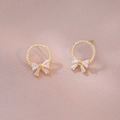 Gold bow earrings with micro-set cubic zirconia stones and elegant circular design - Golden Bow Circle Style (E1105)