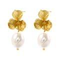 Detailed macro of gold flower stud earrings with elegant white oval pearl drops - Gold