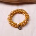 Detailed macro shot of yellow faceted crystal beaded bracelet with silver Morana charm - Jelly Yellow