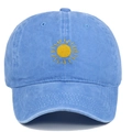 Close-up of sun embroidery on a washed light blue vintage-style cotton baseball cap - Light Blue