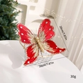 Farfalla di Natale in tessuto rosso con glitter dorati e strass argentati, misura 20cm - 20cm / Rosso