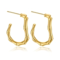 Macro view of gold-plated bamboo-shaped U-style earrings with detailed metal texture - Bamboo Texture Style (C185)