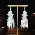 Ethnic silver-finish long tassel drop earrings with intricate hollow-out metal design - Ethnic Hollow Tassel Style (E3140)