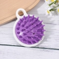 Purple silicone scalp massager brush with white ring handle on wooden surface - Japanese Style White+Purple
