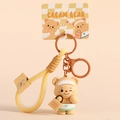 Cream Bear cartoon keychain with yellow braided strap and brown matte metal ring buckle - Yellow Handbag