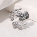 Minimalist stainless steel flower open ring in silver finish with adjustable band design - Steel