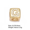 Detailed view of gold G-letter charm bead with cubic zirconia and size dimensions - Letter G