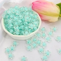 Frosted cyan acrylic star beads in heart-shaped bowl for DIY jewelry making - Cyan Transparent Star (83pcs)