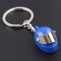 Creative blue motorcycle helmet keychain with movable metal visor on black background - Blue