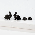 Detail of matte black rabbit earrings with hollow heart cut-outs and matching butterfly backs - 283 Black (Rabbit)