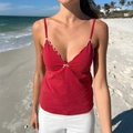 Rotes Damen-Top mit Punkten, weißem Wellensaum und Schleife am sommerlichen Strand - S / Rot
