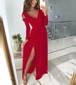 Detail view of the red long-sleeve V-neck dress with shoulder cut-outs and side slit - S / Bottoms / Red