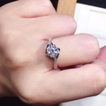 Silver criss-cross wedding ring with a large moissanite center stone and small side diamonds - Women's [1 Carat] Ljz-137 / Adjustable Open