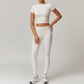 Two-piece brushed yoga set with high waist leggings and short sleeve top in off-white - S / Top And Bottom / Short Sleeve + Leggings / Pearl Grey