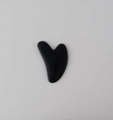 Polished black resin heart-shaped Gua Sha tool for professional body massage and facial care - Black Heart