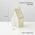 Casetta di Natale in ceramica bianca con bordi dorati e finestre luminose a LED - Grande Casa Nella Foresta