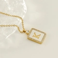 Square gold stainless steel necklace with crystal pavé and letter K on white shell - Gold-K