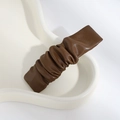 Dark brown pleated PU leather hair clip with elegant textured finish on ceramic tray - Wrinkled / Pleated Dark Coffee