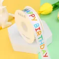 White polyester ribbon roll with colorful Happy Birthday text for gift wrapping - Happy Birthday