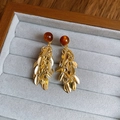 Detail of gold leaf tassel earrings with amber beads in a velvet jewelry box - Amber Bead Leaf Tassel Style (6# Silver Earring Post-Gold-Coffee)