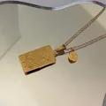 Collar Géminis de acero dorado con colgante rectangular y símbolo del zodíaco - Géminis