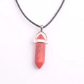 Natural red stone hexagonal pillar pendant necklace with black cord on white background - Red Turquoise (Synthetic)