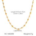 Vista dettagliata della collana d'oro in acciaio con dimensioni esatte e ciondoli a cuore - Stile Distanziato Cuore e Stella (HC-N40299)