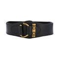 Detail eines schwarzen elastischen Korsettgürtels mit goldenem D-Ring und gestepptem Leder - Schwarz