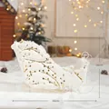 Christmas sleigh decoration in white faux fur with gold patterns and metal frame - Large Gold and White Sleigh