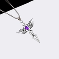Detailed close-up of silver sword cross pendant with angel wings and purple gemstone - Purple Angel Wing Sword