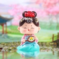 Traditional Chinese girl resin ornament with pink hanfu and red peony flower headwear - Holding Fan