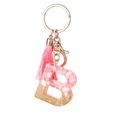 Llavero de resina rosa letra B con copos dorados y una borla de seda elegante a juego - Pan de Oro Rosa B