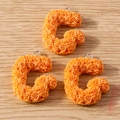 Close-up of three orange resin C-shaped charms with 3D rose textures and metal loops - Letter G / 10 Pieces Pack / Orange