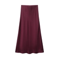 Detailed view of burgundy satin midi skirt with elegant glossy finish and smooth texture - XS / Burgundy
