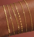 Set of six gold-plated titanium steel bracelets featuring paperclip and Cuban link designs - Gold Flat Bead Cuban Paperclip 6-Piece Set