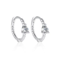 Macro view of twisted rope texture silver hoop earrings with pear-shaped zircon stones - White Gold - White Zirconia