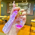 Purple acrylic heart keychain with floating girl doll and sparkling liquid sand - Purple Hat Girl Heart Perfume Bottle